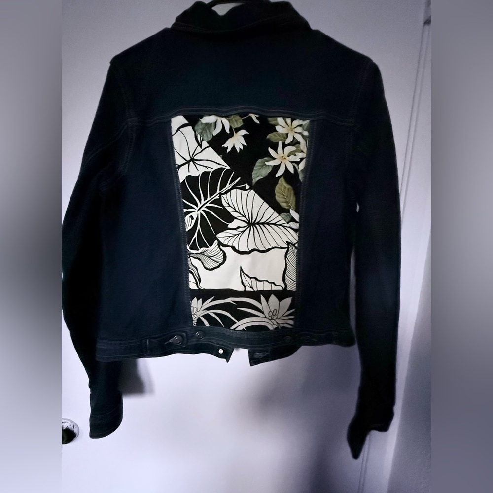Dark blue jeans jacket with material patch